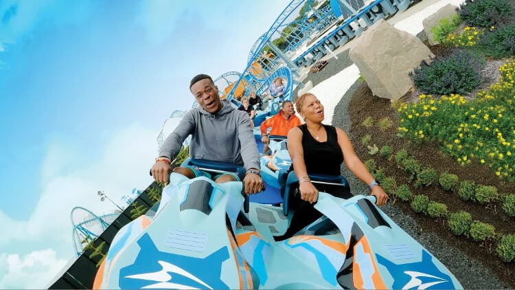 People riding Arctic Rescue roller coaster at SeaWorld San Diego