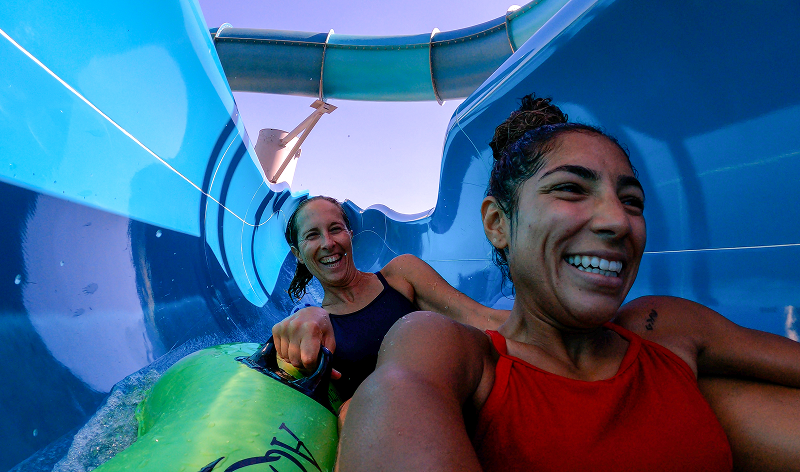 people on water slide