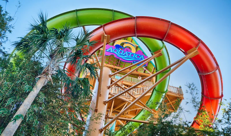 Aquatica sign on the side of a water slide stair structure
