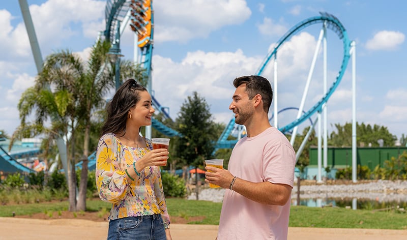 Guests in front of the Pipeline roller coaster