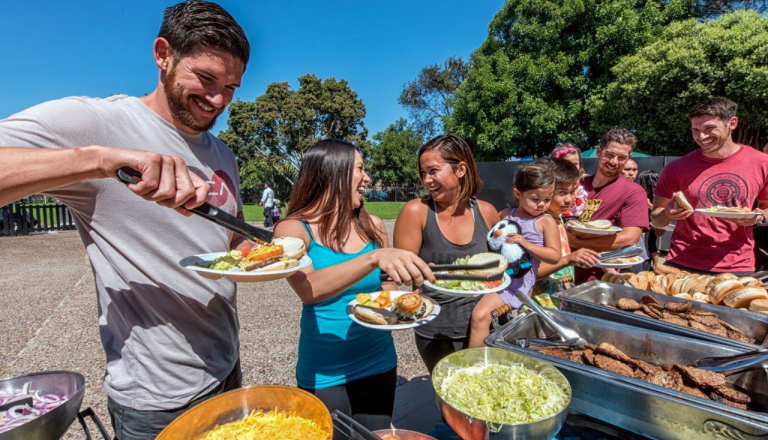 People at a picnic buffet outside
