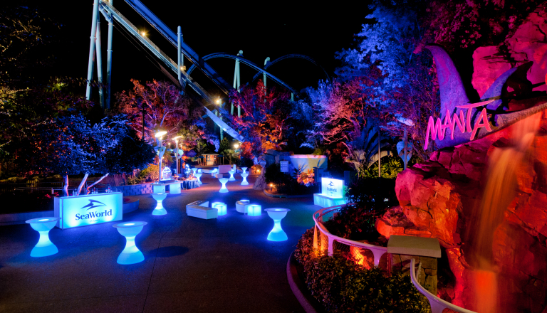 Event space lit up colorful at night