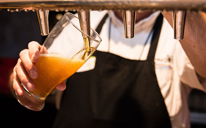 Enjoy some food and drinks at Flamecraft Bar at SeaWorld Orlando