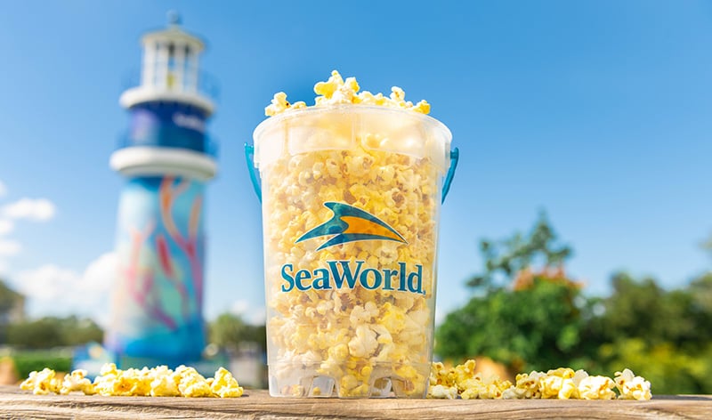 Popcorn bucket in front of SeaWorld lighthouse