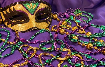 Mardi Gras mask and beads