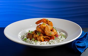 Lobster and Shrimp Cake with a Caribbean remoulade and salsa verde