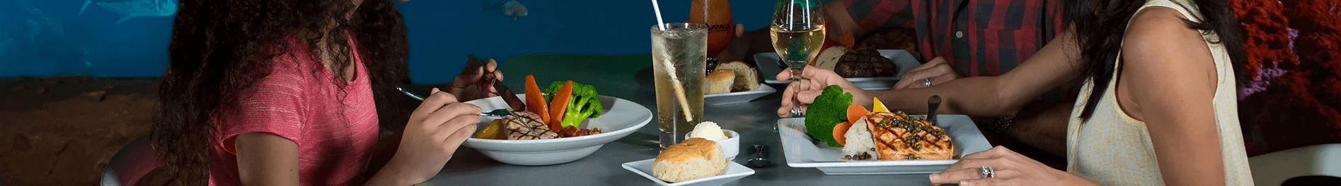 Family eating at Shark's Underwater Grill