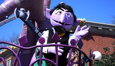 The Count on a parade float at Sesame Street Land SeaWorld Orlando