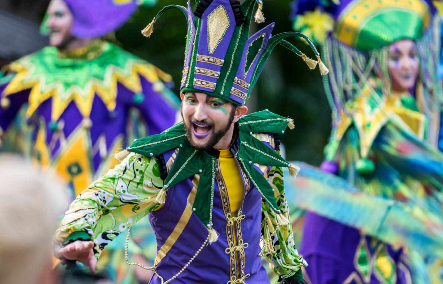 A Mardi Gras Jester as a part of entertainment offerings at SeaWorld San Antonio Mardi Gras.
