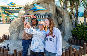 selfie in front of sign