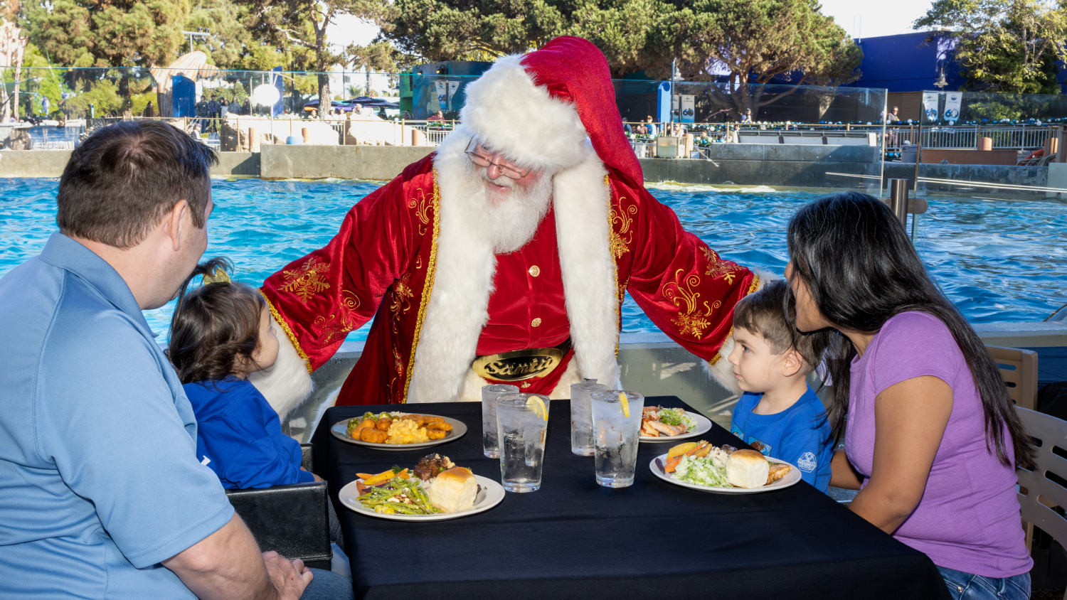 Family dining with Santa at SeaWorld San Diego