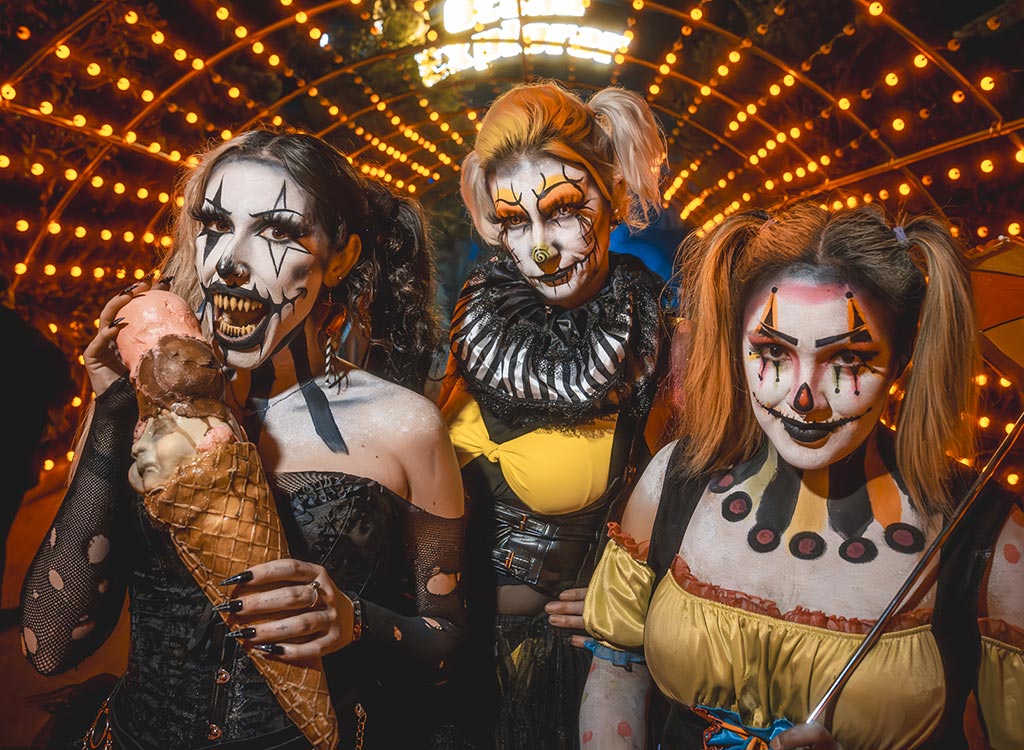 Three Howl-O-Scream clowns