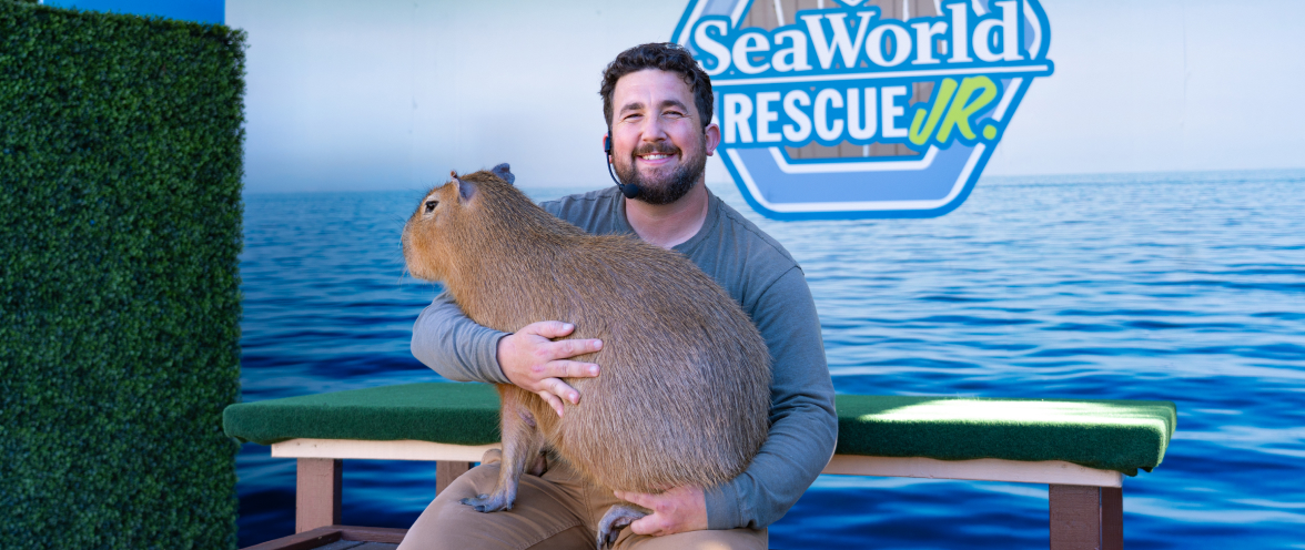 Man with a capybara
