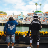 Ying Yang Twins on stage facing a crowd