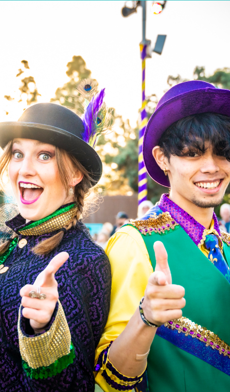 Two Mardi Gras performers at SeaWorld San Diego