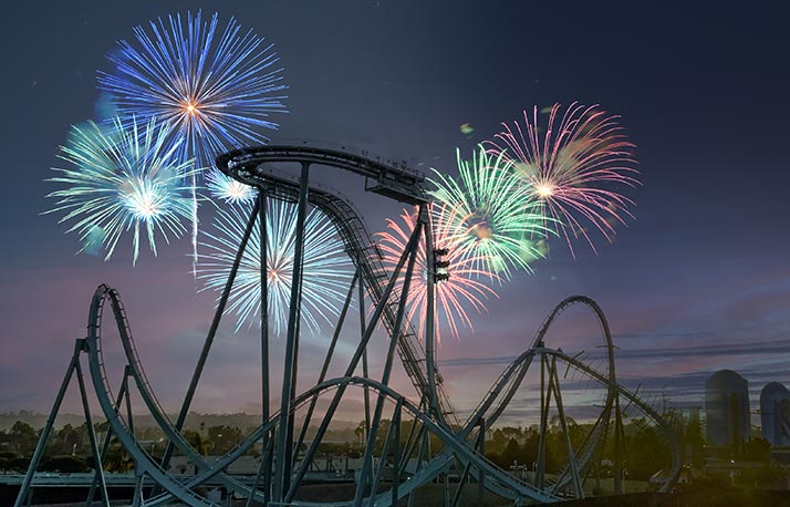 Emperor roller coaster at night with fireworks
