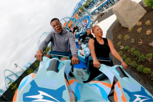 Guests riding Arctic Rescue roller coaster at SeaWorld San Diego