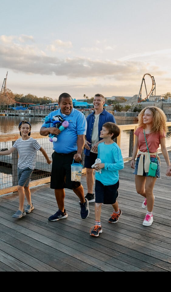 Family walking with a SeaWorld Tour Guide